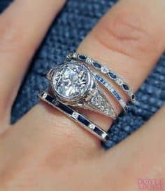 Love the classic combination of diamond and sapphire bands with an Art Deco engagement ring