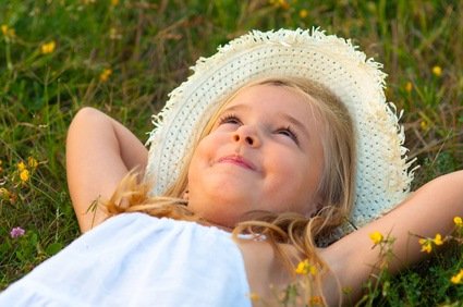 little girl daydreaming of her wedding day