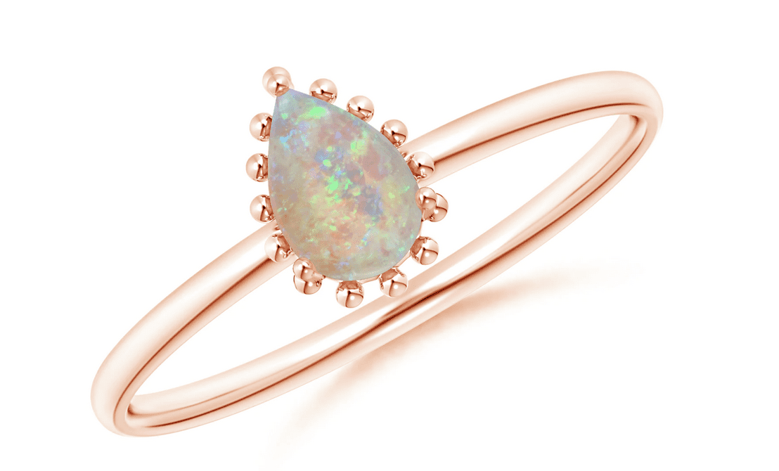 0.26 Carat Pear Shaped Opal Beaded Ring 