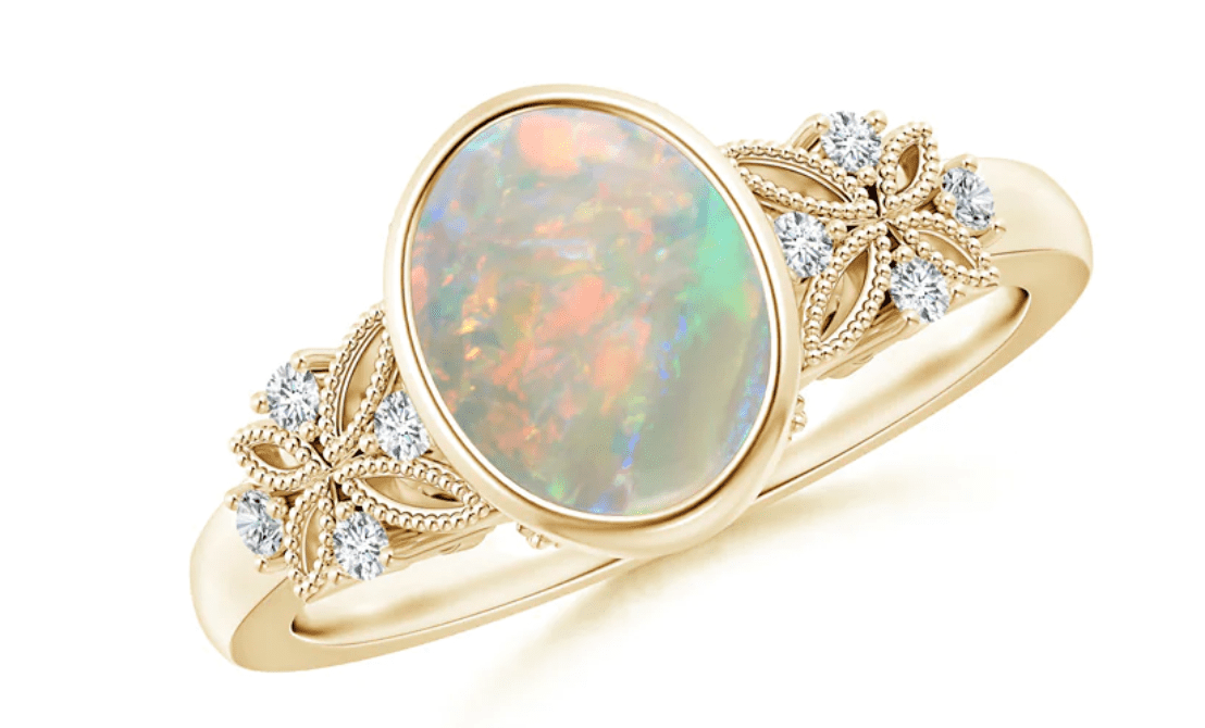 0.53 to 1.22 Carat Vintage Style Oval Opal Ring with Diamonds